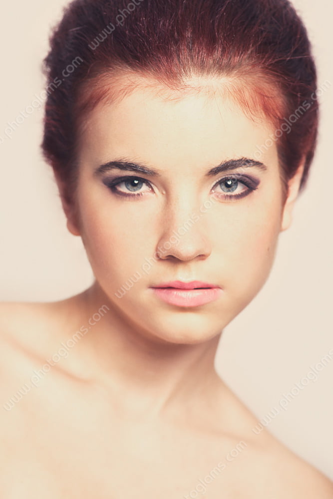 The glamor shot of a redhead model 
